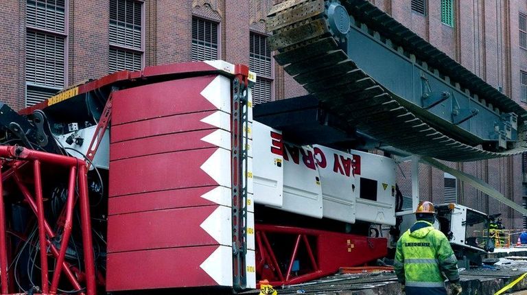 The cab and base of a crane lay