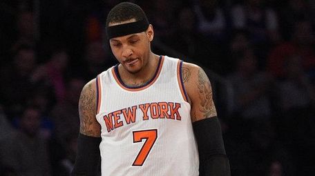 New York Knicks forward Carmelo Anthony reacts in