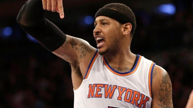 Carmelo Anthony reacts to a referee's call during