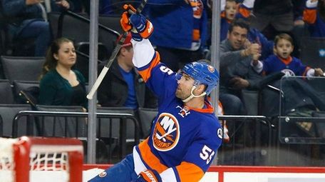 Johnny Boychuk of the New York Islanders celebrates