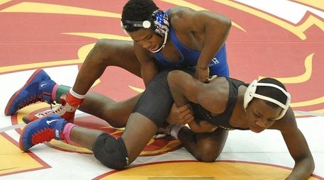 Jacori Teemer of Long Beach, top, battles Najee