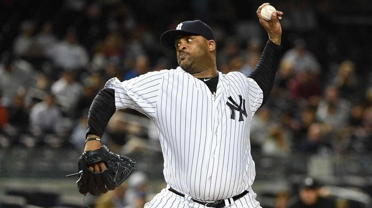 New York Yankees starting pitcher CC Sabathia delivers
