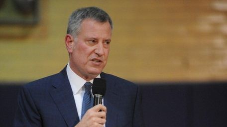 Mayor Bill de Blasio tells an audience at