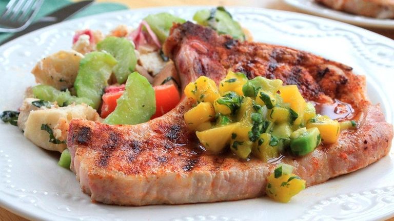 Lean pork chops are pan-grilled and topped with