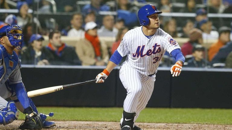 New York Mets left fielder Michael Conforto smacks