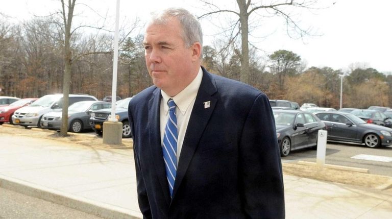 Edward Walsh arrives at federal court in Central
