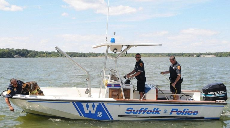 A Suffolk County police marine boat with a