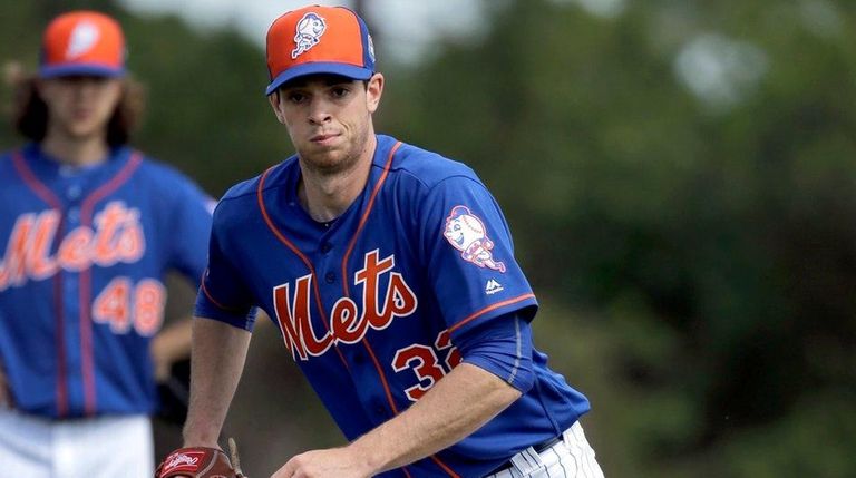 New York Mets pitcher Steven Matz chases a