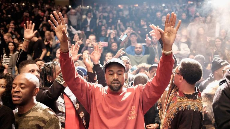 Kanye West performs during his Yeezy Season 3