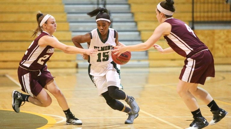 Elmont's Zhaneia Thybulle, center, is defended by