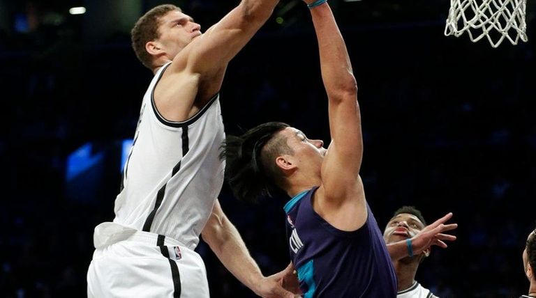 Brooklyn Nets' Brook Lopez blocks a shot