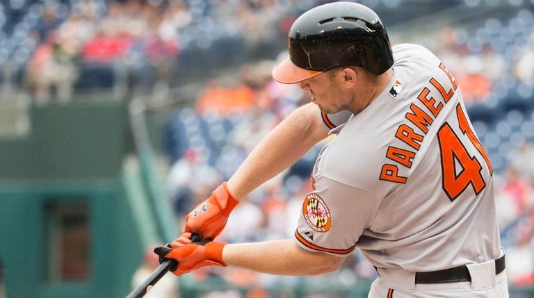 The Baltimore Orioles' Chris Parmelee makes contact