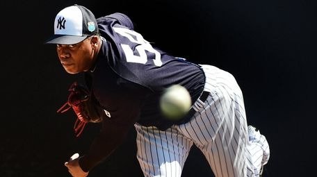 New York Yankees' Aroldis Chapman throws during spring