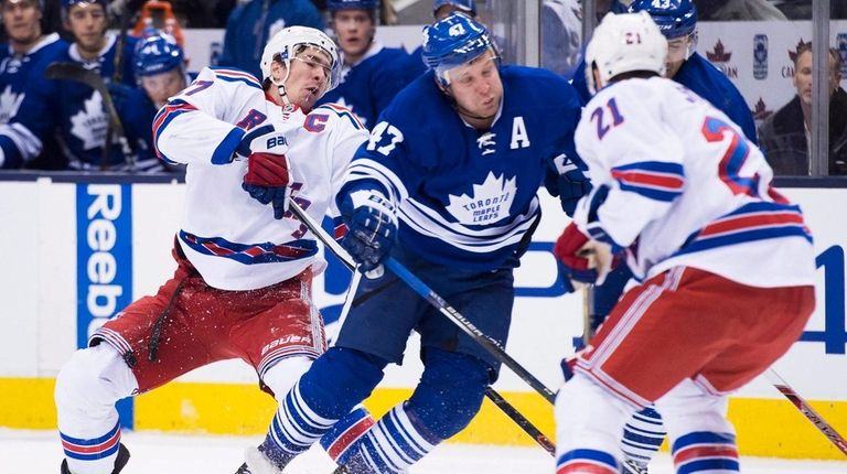 Toronto Maple Leafs center Leo Komarov hits New