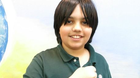 Kidsday reporter Asad Arif wears his iRULU smart