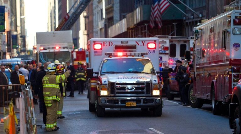 A member of the FDNY gives a thumbs