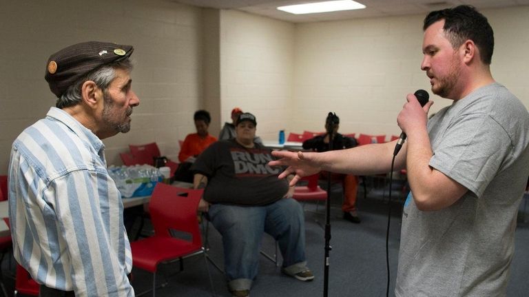 Brian Cutaia, right, leads a Project9line comedy workshop