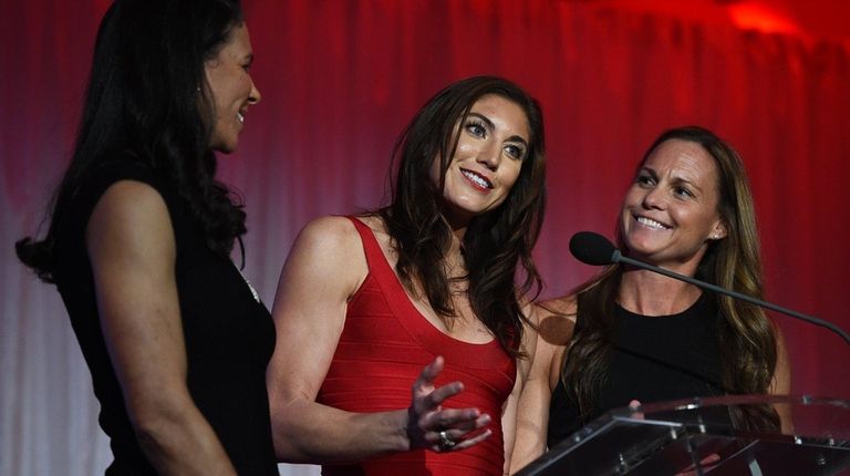 From left, Shannon Boxx, Hope Solo and Christie