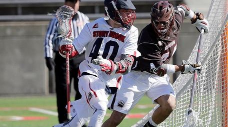 Stony Brook attack Matt Schultz (40) drives