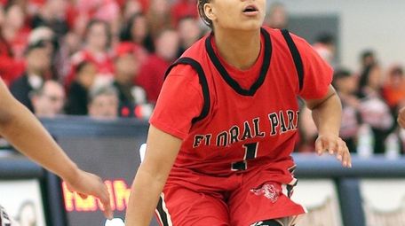 Floral Park's Kaela Hilaire looks up the middle