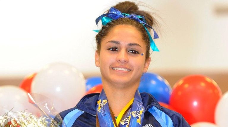 Commack's Lauren Gomes on the podium after winning
