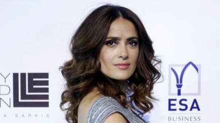 Actress Salma Hayek poses for photographers in Beirut,