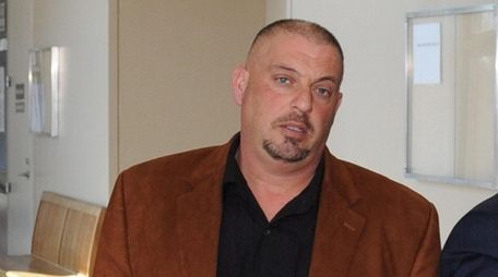 A truck driver testified Tuesday he hauled debris