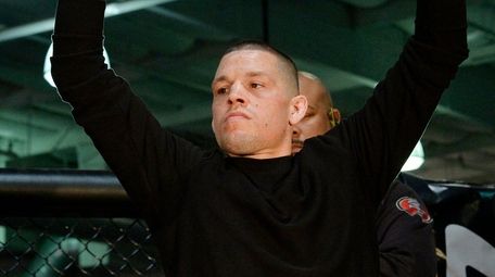 Nate Diaz poses during a news conference with