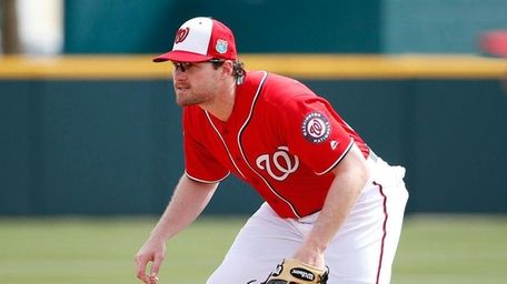 Daniel Murphy #20 of the Washington Nationals fields