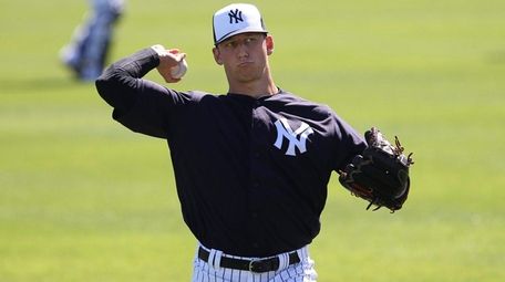 Yankees pitcher James Kaprielian in action during a
