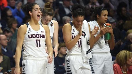 Connecticut's Kia Nurse (11) cheers on her