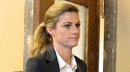 Sportscaster and television personality Erin Andrews walks