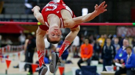 Daniel Claxton clears bar during victory at state