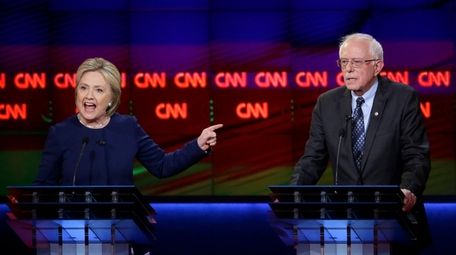 Democratic presidential candidates Hillary Clinton, left, and, Sen.