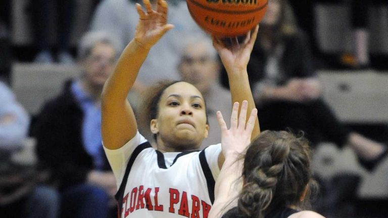 Floral Park's Kaela Hilaire (1) puts a shot