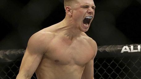 Chris Wade celebrates after defeating Cain Carrizosa by