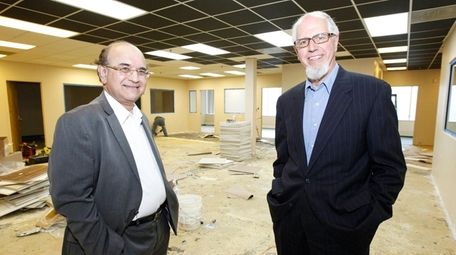 Raj Mehta, CEO of Infosys International, and Peter
