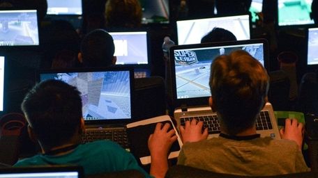 Young video gamers engage in a multiplayer game