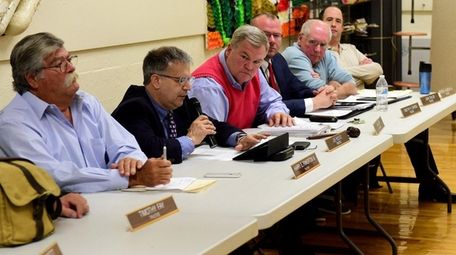Members of the Bayville Village Board, including Mayor