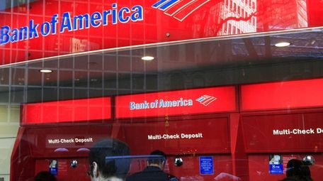 In this 2011 photo, Bank of America customers