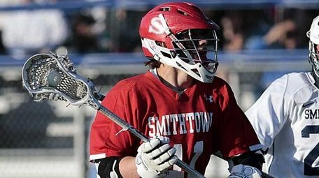 After winning a face-off, Smithtown East's Gerard