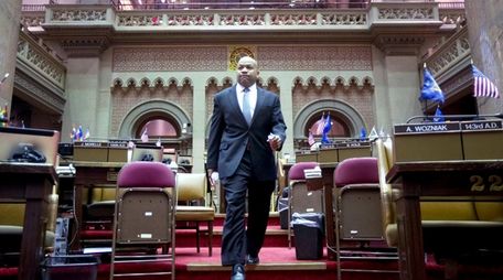 Assembly Speaker Carl Heastie (D-Bronx) walks through the