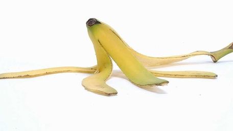 Teens are slipping on banana peels in a