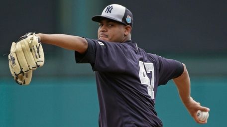 New York Yankees' Ivan Nova pitches in the