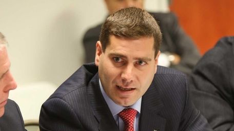 Suffolk County Police Commissioner Timothy Sini speaks during