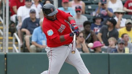 Boston Red Sox's Pablo Sandoval swings at a