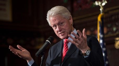 Former President Bill Clinton speaks to members of