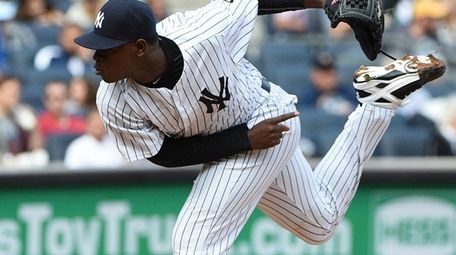 New York Yankees starting pitcher Luis Severino delivers