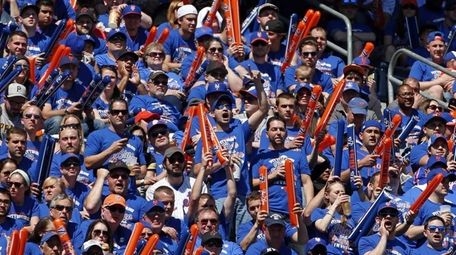 A group of New York Mets fans cheer