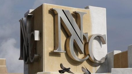 The Nassau Community College logo on the school's